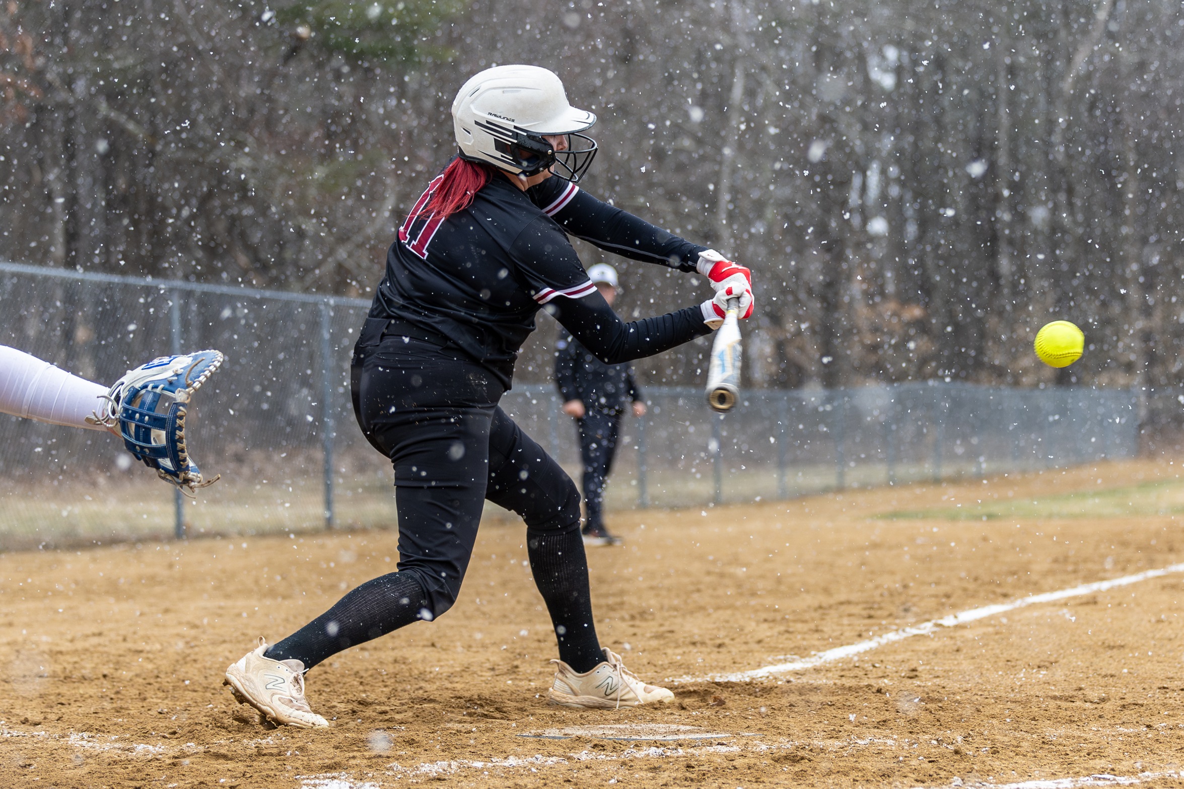Softball Drops Two Against Pilgrims In Conference Opener
