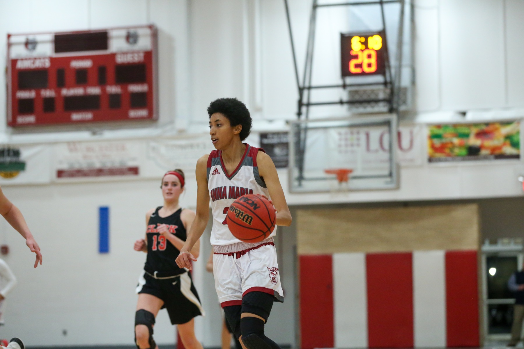 AMCATS Roar Past Raiders, 77-63 For First GNAC Win